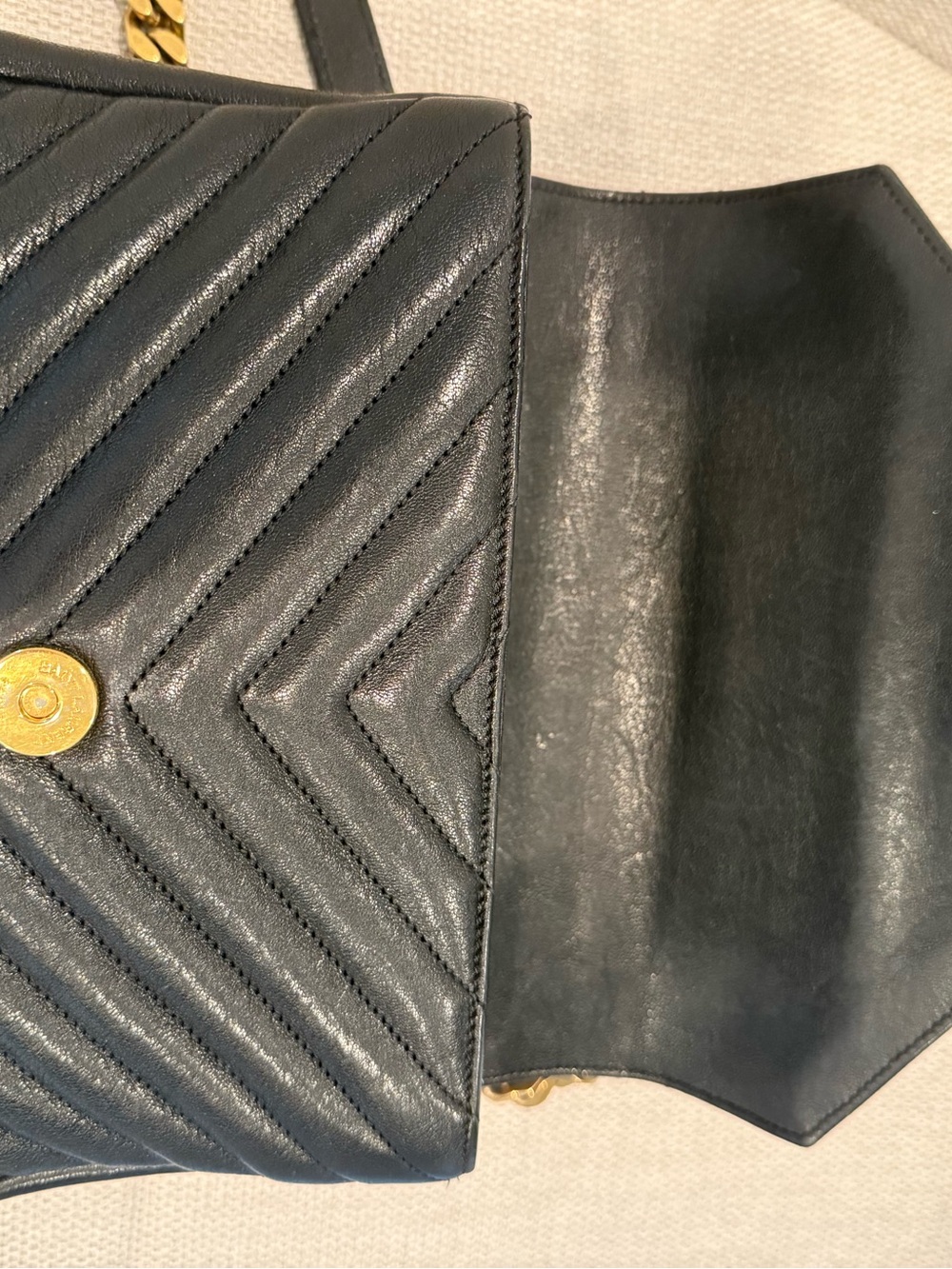 YSL confirm 
Black Quilted Leather Shoulder Bag with Gold Hardware